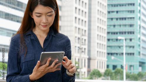 Business woman using smartphone shopping online, call, texting message internet technology lifestyle. Asian woman using cellphone walking on city street. Smart phone smart confident woman modern city