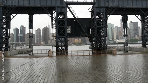 New York City waterfront skyline, Manhattan midtown, riverfront skyscrapers by East river water. Waterside cityscape view from Gantry Plaza dock pier, Long Island, Queens. United States architecture.