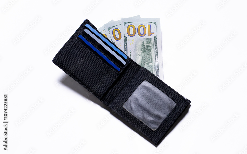 Banknote in black wallet isolated on white background. After edits. Banknote in black wallet isolated on white background. After edits.