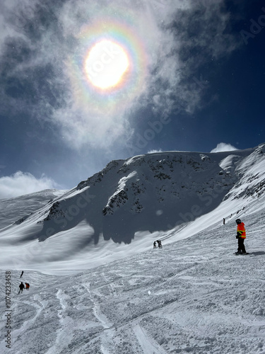 Skiers on the top of the mountain