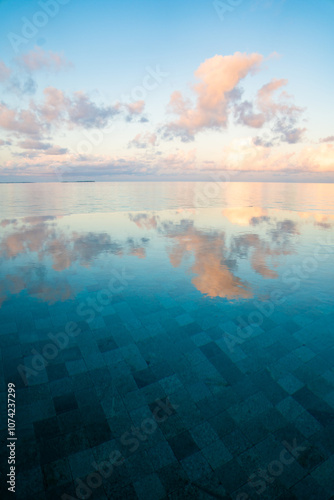 Fototapeta Naklejka Na Ścianę i Meble -  Sunset views from overwater pool villa in Maldives