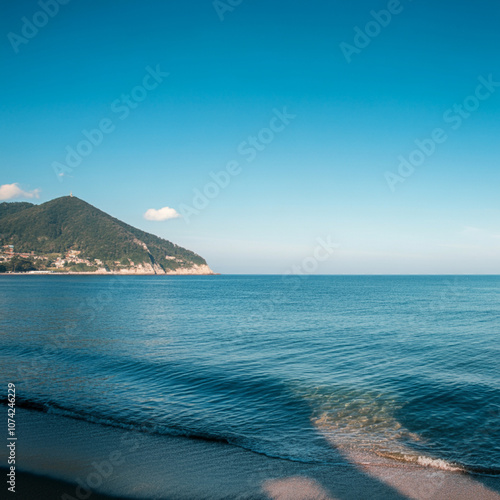 The beach, blue sky, and sparkling ocean make for a dreamy vacation atmosphere