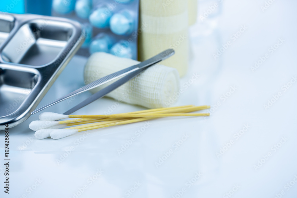 Medical equipment for treating infections. Wound care dressing set. Medical supplies for nurses. Conform bandage, forceps, cotton stick, alcohol. Sterile dressing materials. Healthcare equipment. Medical equipment for treating infections. Wound care dressing set. Medical supplies for nurses. Conform bandage, forceps, cotton stick, alcohol. Sterile dressing materials. Healthcare equipment.