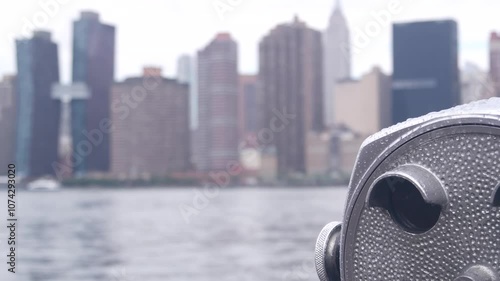 New York City waterfront skyline, Manhattan Midtown buildings, riverfront skyscrapers by East river. Waterside cityscape, tower viewer, Gantry Plaza. Long Island, Queens. United States tourism. Rainy.