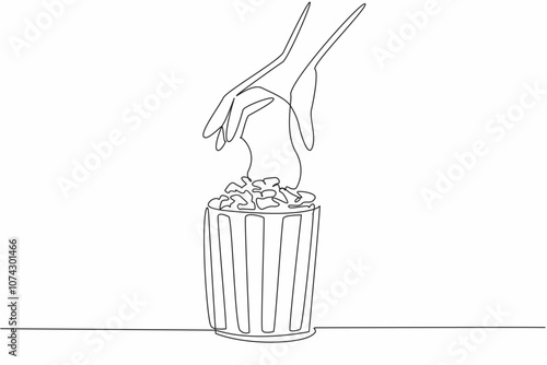 Happy National Popcorn Day. Single continuous line drawing of person hand picking caramel flavor popcorn up from stripped pop corn paper bucket. Food snack concept. One line draw vector illustration