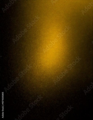 Abstract yellow and black gradient background with a textured effect, ideal for creative and artistic wallpapers