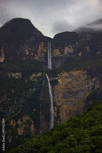 Stunning panoramic view of the Gocta waterfall located in the lush Peruvian Amazon rainforest, in the Amazonas region. Ideal destination for nature lovers located in the community of Cocachimba, Peru. photo