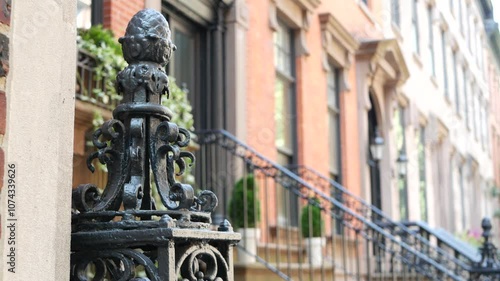 New York City townhouse building, Brooklyn Heights residential district, USA. Brownstone urban architecture, attached house. United States real estate, american property, apartments and homes in NYC.
