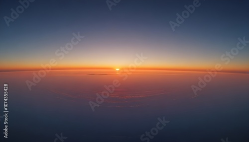 Beautiful sky with soft gradient colors transitioning from blue to vibrant orange at sunset time