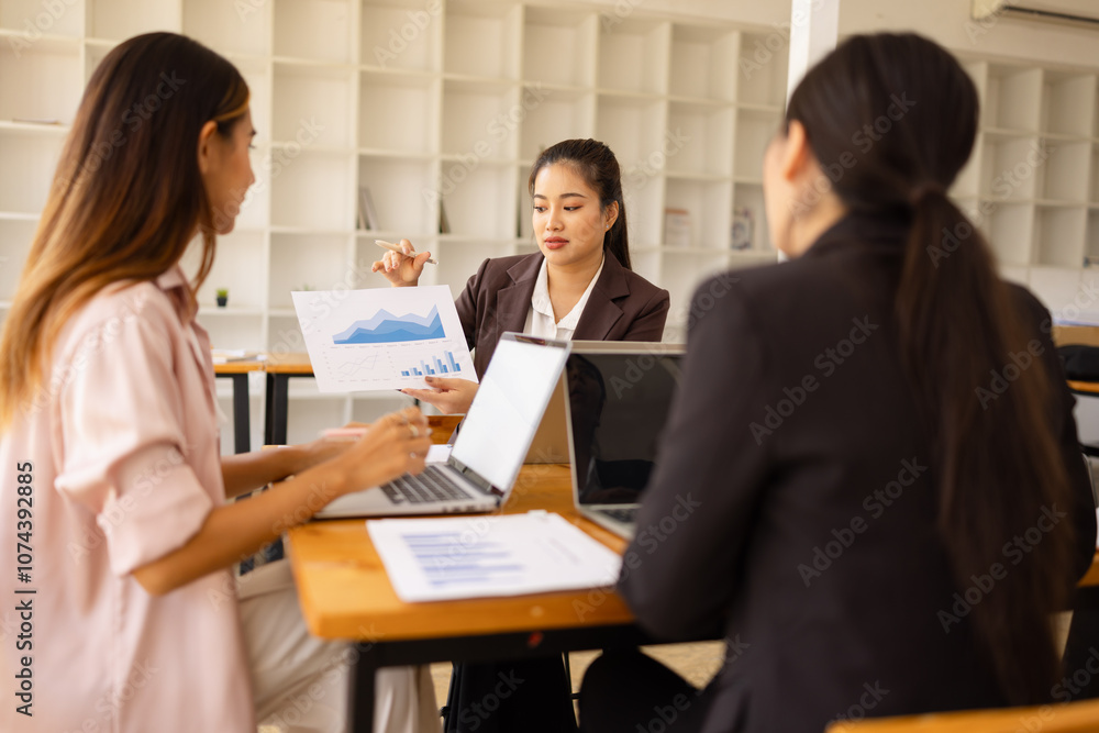 Asian businesswoman teamwork working on laptop with finances analysis report at desk in office, business financing, accounting banking, Team of creative and business planning, Asian businesswoman teamwork working on laptop with finances analysis report at desk in office, business financing, accounting banking, Team of creative and business planning,