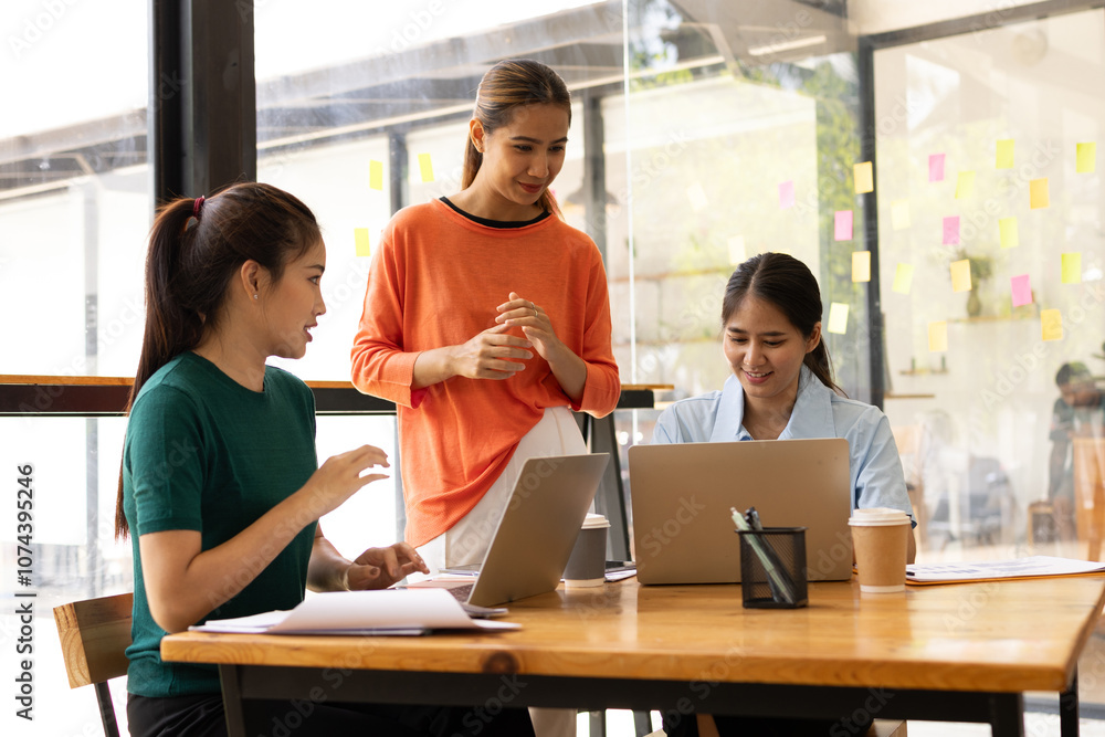 group of asian businesswoman working on laptop with finances analysis report at desk in office, business financing, accounting banking, Team of creative and business planning, group of asian businesswoman working on laptop with finances analysis report at desk in office, business financing, accounting banking, Team of creative and business planning,