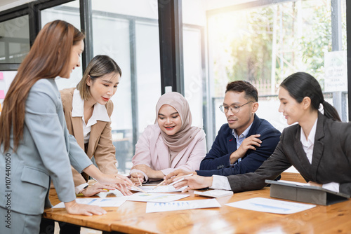 Team of Asian business people and working together in office, Startup projects and business presentation at meeting room, Brainstorming and business,