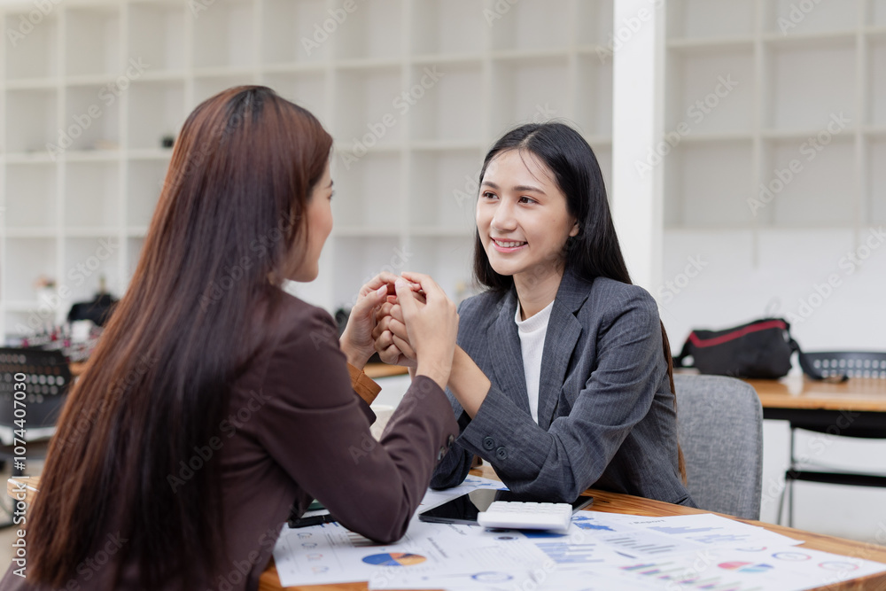 Asian businesswoman working on laptop with finances analysis report at desk in office, business financing, accounting banking, Asian businesswoman working on laptop with finances analysis report at desk in office, business financing, accounting banking,