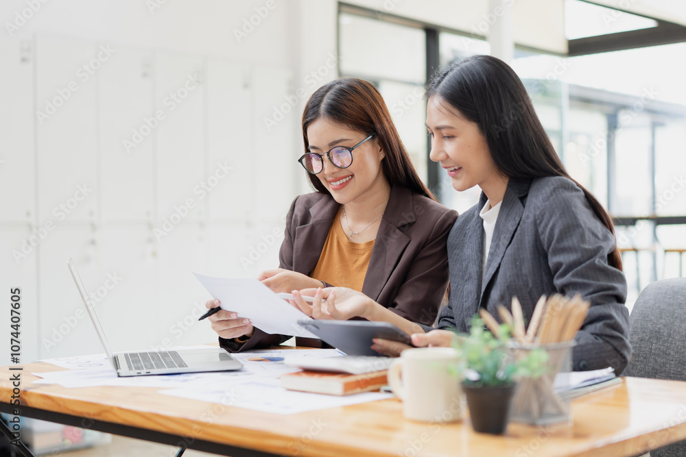 Two businesswoman working with analysis data investment plan, Business startup and marketing presentation, Two businesswoman working with analysis data investment plan, Business startup and marketing presentation,
