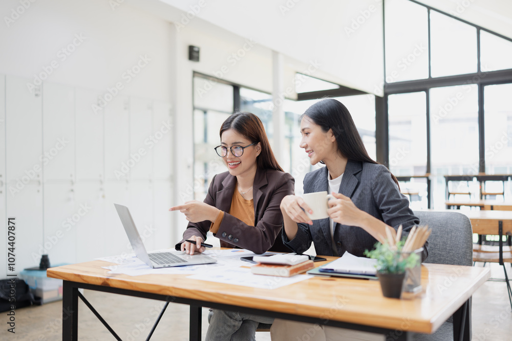 Two businesswoman working with analysis data investment plan, Business startup and marketing presentation, Two businesswoman working with analysis data investment plan, Business startup and marketing presentation,