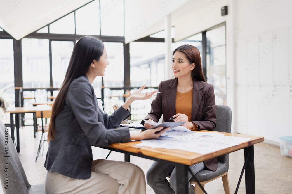 Two businesswoman working with analysis data investment plan, Business startup and marketing presentation, Two businesswoman working with analysis data investment plan, Business startup and marketing presentation,