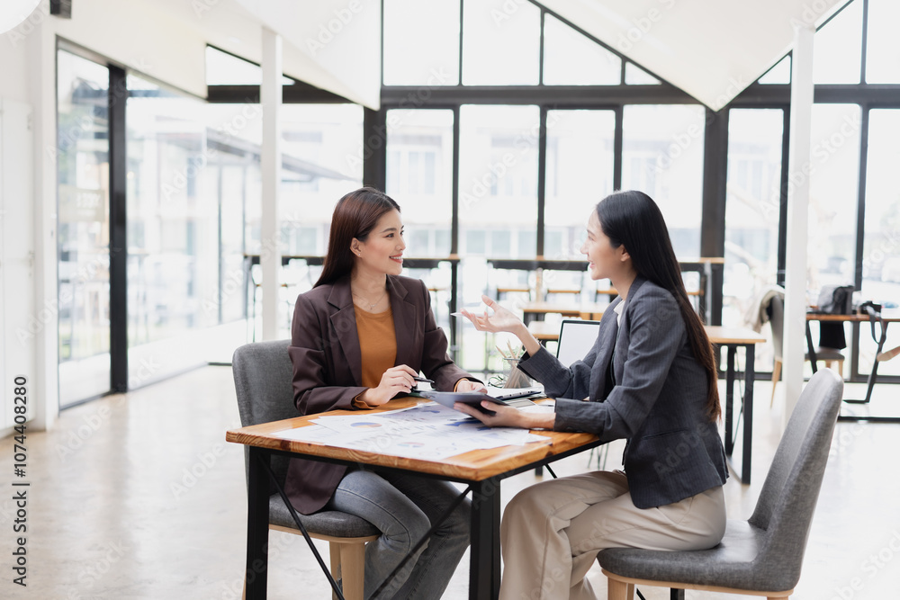 Two businesswoman working with analysis data investment plan, Business startup and marketing presentation, Two businesswoman working with analysis data investment plan, Business startup and marketing presentation,