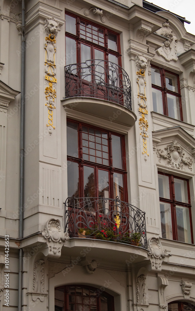 Fototapeta premium old balconies of Czech houses, on a quiet street, in the morning