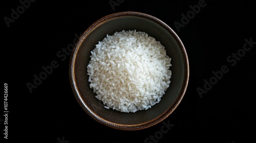 Bowl of white rice on a black background banner, top view.  - ai