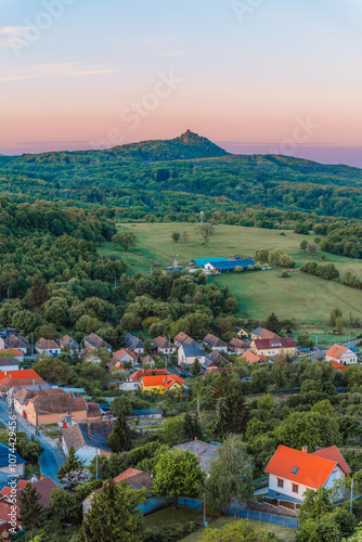 Ruins of a medieval castle Somoska or Somoskoi var on borders of southern Slovakia and Hungary at sunrise time. photo