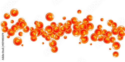Vitamin E round capsules scattered randomly.