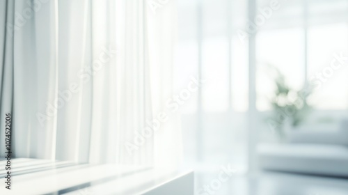 Bright and airy interior space featuring soft curtains and a cozy seating area, illuminated by natural light during the day