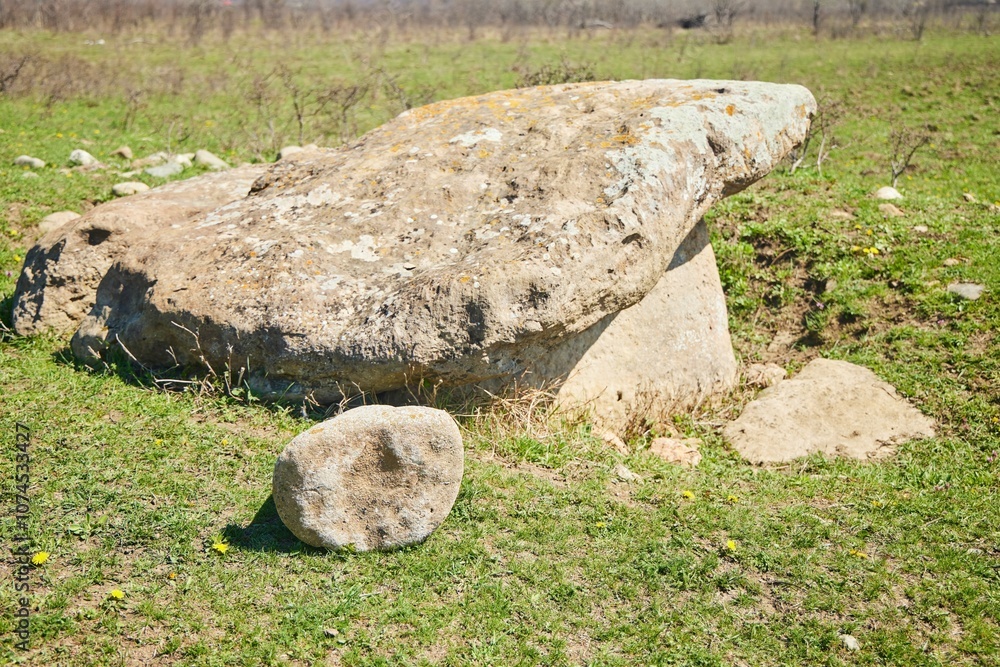 The remains of an ancient stone structure dolmen. Archaeology, 2-3 millennia BC