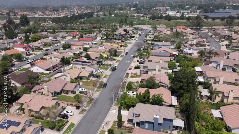 Homes In A Suburban Neighborhood Of Ontario In San Bernardino, California. Aerial Flyover. Homes In A Suburban Neighborhood Of Ontario In San Bernardino, California. Aerial Flyover.