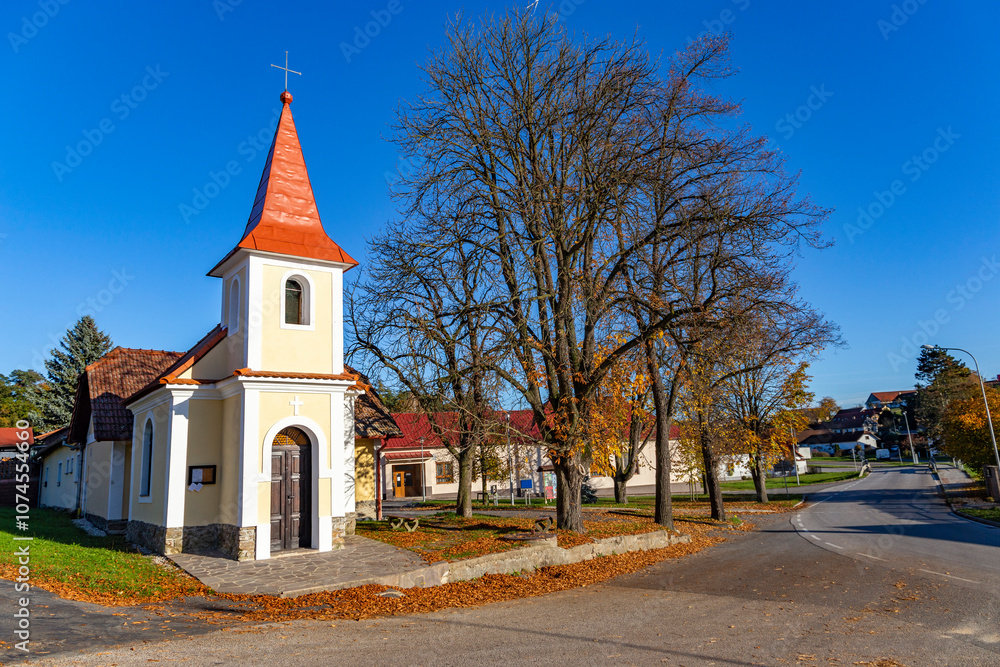 A small chapel in a Czech village Breznice on an autumn day.