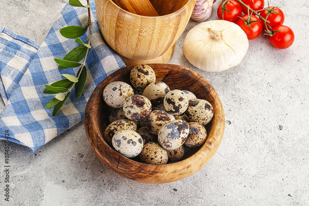 Raw quail eggs in the bowl