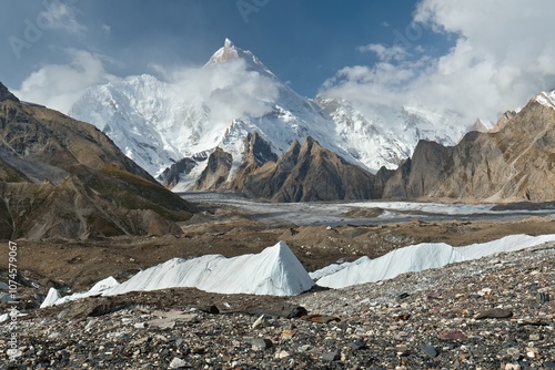 View from Baltoro Glacier to K1 Peak Masherbrum 7,821 meters high and Yermandu Glacier, near Gore 2 campsite. Karakoram Mountains. Gilgit-Baltistan region. Pakistan. Asia. photo