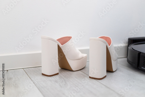 Platform high heels on a tapped in white with block heel as mules