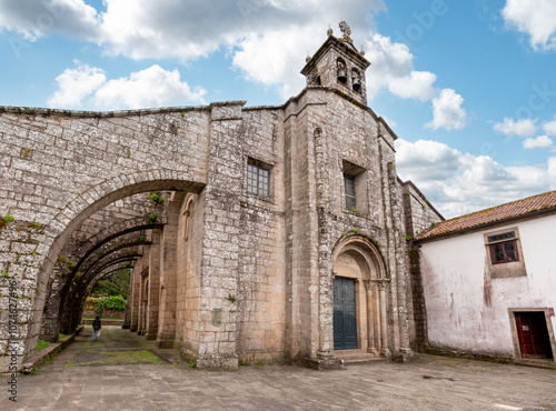 Ancient collegiate church Santa Maria de Sar in Santiago de Compostela with giant buttresses  subsequently built due to static problems