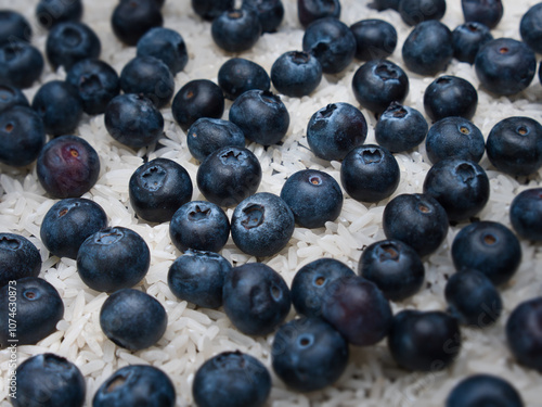 Blueberries lying on rice grains when viewed at different focus level