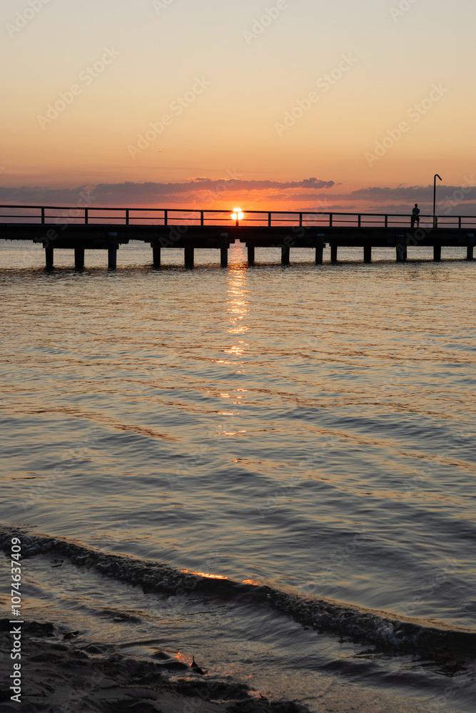 Jetty pier at sunset, Fraser Island K'gari, Queensland Australia, summer weekend coastal lifestyle vacation holiday, travel tourist destination Jetty pier at sunset, Fraser Island K'gari, Queensland Australia, summer weekend coastal lifestyle vacation holiday, travel tourist destination