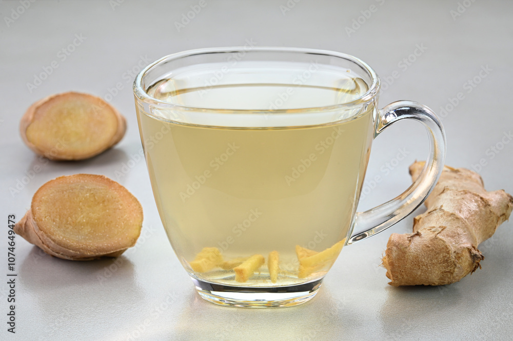 Ginger water in a glass cup. Ginger water in a glass cup.