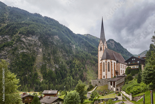 Picturesque Heilingenblut church in Grossglockner alpine mountain road. Carintia, Austria photo