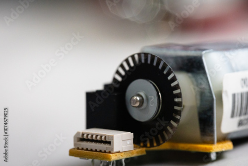 Close up and focused on Rotary Encoder disc for DC motors, angle control, position control