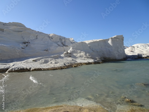 Sarakiniko beach, geological white rocks  beach, a tourist attraction in Milos island, Greece. Cyclade island with scenic landscape and copy space. Pumice volcanic rocks  photo