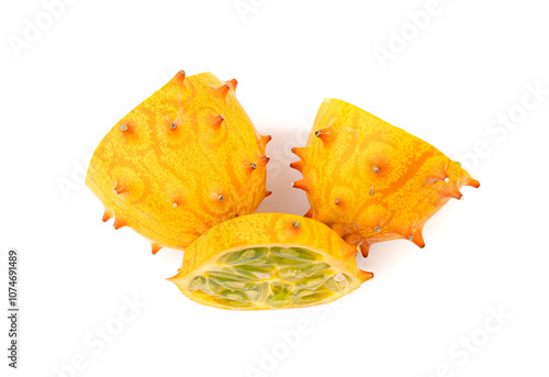 Kiwano cuts isolated, jelly melon halves, cucumis metuliferus, horned melon, african horned cucumber photo