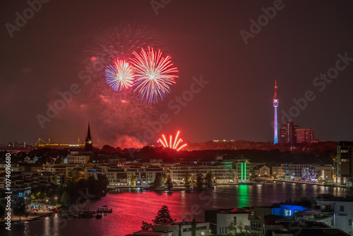 View of the night landscape and fireworks Phoenix Lake, Dortmund,Germany
