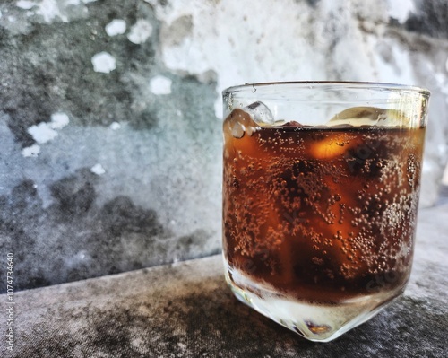 Cola drink with ice cubes