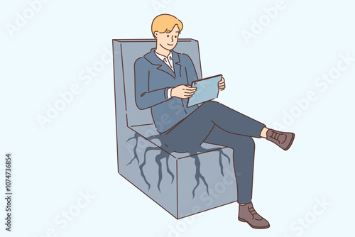 Sedentary business man is rooted to office chair, sitting with electronic tablet in hands