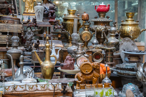 Antique display featuring a clock with clock written on it, Kashan, Iran photo