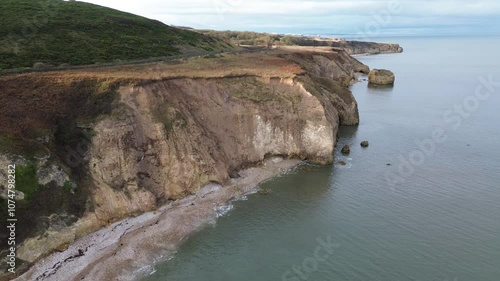 Dramatic Aerial of North East cliffs and coastline at Shippersea Bay - County Durham, UK. photo