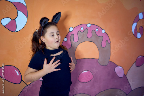 a little girl acts as a wolf at an acting class, extracurricular activities photo