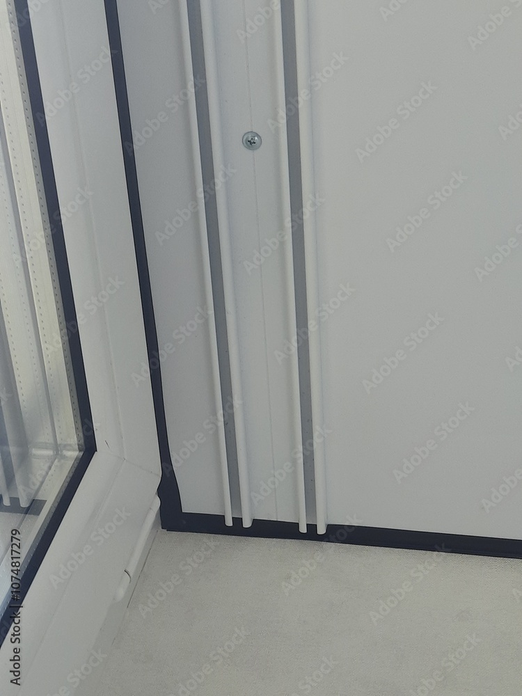 Obraz premium Ceiling cornice on a white stretch ceiling.