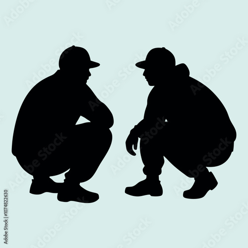 a vector silhouette of two people in a squatting position, facing slightly toward each other