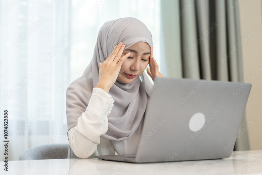 Young muslim woman in hijab experiencing stress and fatigue, headache, expressing emotions, mental health concept, sick, psychological wellbeing, personal reflection, diseased and migraine Young muslim woman in hijab experiencing stress and fatigue, headache, expressing emotions, mental health concept, sick, psychological wellbeing, personal reflection, diseased and migraine