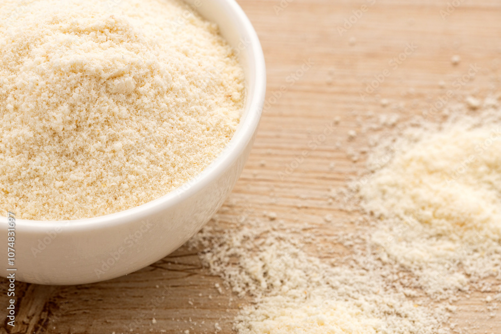 Organic gelatin powder also called hydrolyzed collagen - White powder in the bowl Organic gelatin powder also called hydrolyzed collagen - White powder in the bowl